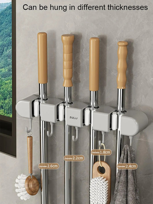 Set of hooks with wooden handles on a gray wall, with text indicating different thicknesses.
