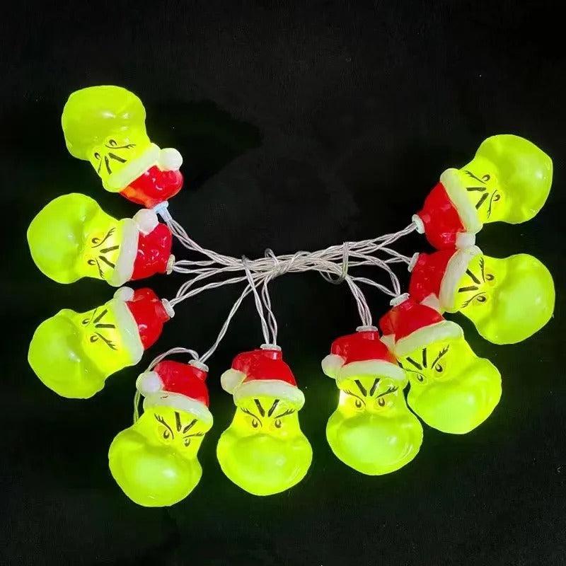 Christmas LED string lights with funny Grinch face design for holiday tree and home decorations